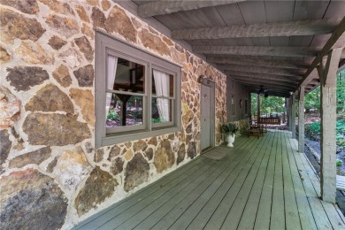 The cozy North Georgia cabin you've been searching for is here on Big Canoe Golf Club - Cherokee in Georgia - for sale on GolfHomes.com, golf home, golf lot
