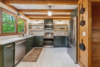 The cozy North Georgia cabin you've been searching for is here on Big Canoe Golf Club - Cherokee in Georgia - for sale on GolfHomes.com, golf home, golf lot