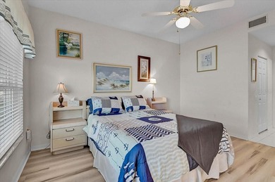 This updated 1st floor end-unit condo is truly move-in ready and on Peridia Golf and Country Club in Florida - for sale on GolfHomes.com, golf home, golf lot