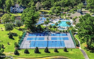 Discover the Skiff, a beautiful new Logan Home, located in on Sea Trail Golf Resort in North Carolina - for sale on GolfHomes.com, golf home, golf lot