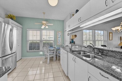 This updated 1st floor end-unit condo is truly move-in ready and on Peridia Golf and Country Club in Florida - for sale on GolfHomes.com, golf home, golf lot