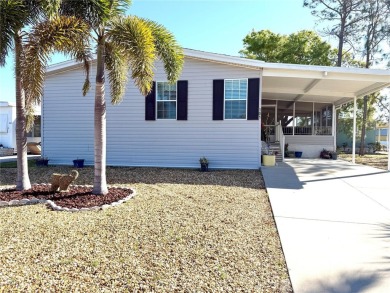 Live the Florida Dream!  This stunning, like-new, 2016 2-bedroom on Apollo Beach Golf and Sea Club in Florida - for sale on GolfHomes.com, golf home, golf lot