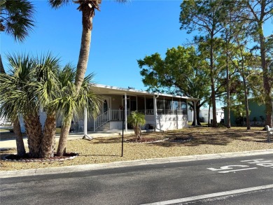 Live the Florida Dream!  This stunning, like-new, 2016 2-bedroom on Apollo Beach Golf and Sea Club in Florida - for sale on GolfHomes.com, golf home, golf lot