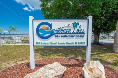 Live the Florida Dream!  This stunning, like-new, 2016 2-bedroom on Apollo Beach Golf and Sea Club in Florida - for sale on GolfHomes.com, golf home, golf lot