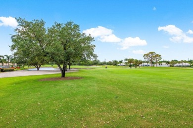 Enjoy serene golf course living in this beautifully maintained on Quail Ridge Golf Course and Country Club in Florida - for sale on GolfHomes.com, golf home, golf lot