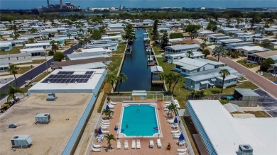 Live the Florida Dream!  This stunning, like-new, 2016 2-bedroom on Apollo Beach Golf and Sea Club in Florida - for sale on GolfHomes.com, golf home, golf lot