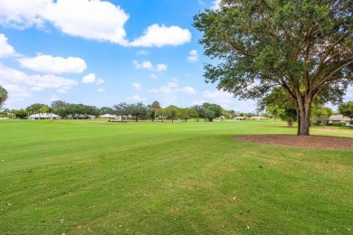 Enjoy serene golf course living in this beautifully maintained on Quail Ridge Golf Course and Country Club in Florida - for sale on GolfHomes.com, golf home, golf lot