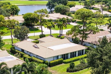 Enjoy serene golf course living in this beautifully maintained on Quail Ridge Golf Course and Country Club in Florida - for sale on GolfHomes.com, golf home, golf lot