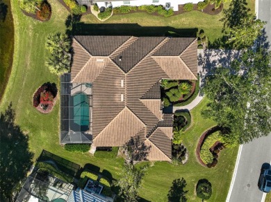 Presenting an exceptional residence with a serene and expansive on Calusa Lakes Golf Club in Florida - for sale on GolfHomes.com, golf home, golf lot