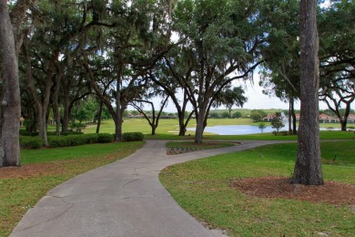 If a country setting with city conveniences is what you desire on Lake Jovita Golf and Country Club in Florida - for sale on GolfHomes.com, golf home, golf lot