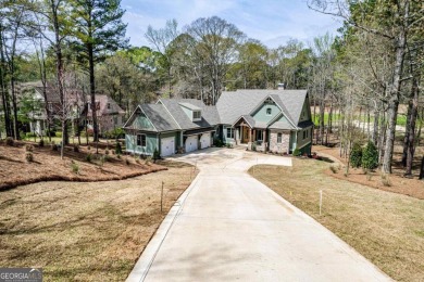 Nestled on the edge of the prestigious Oconee course, this on Reynolds Lake Oconee - The Oconee in Georgia - for sale on GolfHomes.com, golf home, golf lot