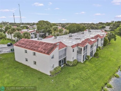 Schedule Today to See This Spacious 3-Bedroom/2-Bath Unit in the on Woodmont Country Club in Florida - for sale on GolfHomes.com, golf home, golf lot