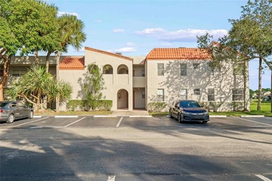 Schedule to See This Spacious 3-Bedroom/2-Bath Unit in the on  in Florida - for sale on GolfHomes.com, golf home, golf lot