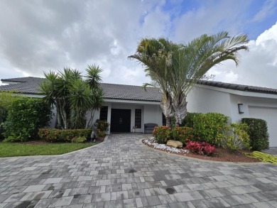 Large open and bright home overlooking the golf course, huge on Boca Woods Country Club in Florida - for sale on GolfHomes.com, golf home, golf lot