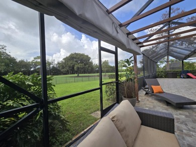 Large open and bright home overlooking the golf course, huge on Boca Woods Country Club in Florida - for sale on GolfHomes.com, golf home, golf lot