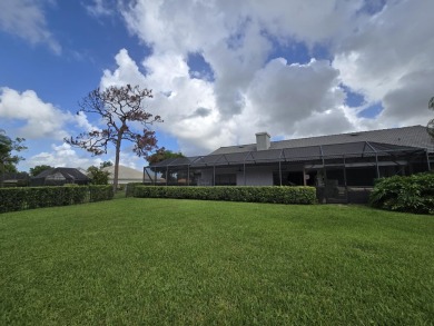 Large open and bright home overlooking the golf course, huge on Boca Woods Country Club in Florida - for sale on GolfHomes.com, golf home, golf lot