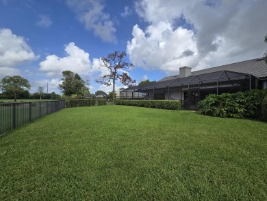 Large open and bright home overlooking the golf course, huge on Boca Woods Country Club in Florida - for sale on GolfHomes.com, golf home, golf lot