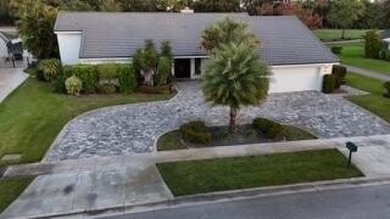 Large open and bright home overlooking the golf course, huge on Boca Woods Country Club in Florida - for sale on GolfHomes.com, golf home, golf lot