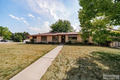 Nestled on a spacious 0.43-acre corner lot along the fairways of on  in Idaho - for sale on GolfHomes.com, golf home, golf lot