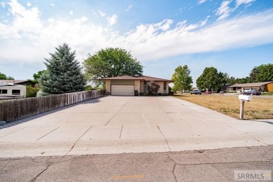 Nestled on a spacious 0.43-acre corner lot along the fairways of on  in Idaho - for sale on GolfHomes.com, golf home, golf lot