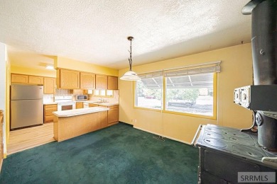 Nestled on a spacious 0.43-acre corner lot along the fairways of on  in Idaho - for sale on GolfHomes.com, golf home, golf lot