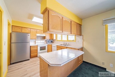Nestled on a spacious 0.43-acre corner lot along the fairways of on  in Idaho - for sale on GolfHomes.com, golf home, golf lot