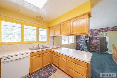 Nestled on a spacious 0.43-acre corner lot along the fairways of on  in Idaho - for sale on GolfHomes.com, golf home, golf lot