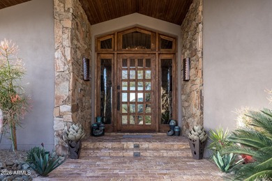 Nestled at the end of a long private drive, this timeless Desert on Desert Mountain Golf Club - Renegade Course in Arizona - for sale on GolfHomes.com, golf home, golf lot