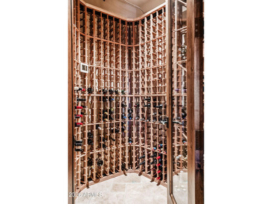 Nestled at the end of a long private drive, this timeless Desert on Desert Mountain Golf Club - Renegade Course in Arizona - for sale on GolfHomes.com, golf home, golf lot