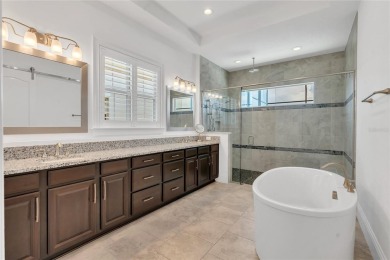 EXQUISITE WATERFRONT GOLF COURSE POOL HOME IN EAGLE CREEK -- on Eagle Creek Golf Club in Florida - for sale on GolfHomes.com, golf home, golf lot