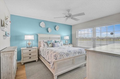 Welcome to this beautiful second-floor end-unit condominium on Peridia Golf and Country Club in Florida - for sale on GolfHomes.com, golf home, golf lot