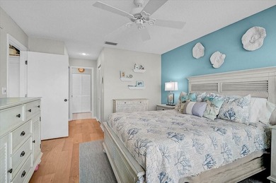 Welcome to this beautiful second-floor end-unit condominium on Peridia Golf and Country Club in Florida - for sale on GolfHomes.com, golf home, golf lot