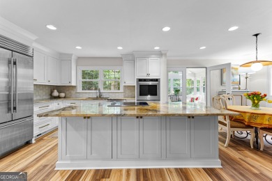 Enjoy the sunset views from 103 Lakeshore Drive, a remarkable on Highland Country Club in Georgia - for sale on GolfHomes.com, golf home, golf lot
