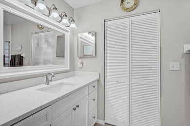 Welcome to this beautiful second-floor end-unit condominium on Peridia Golf and Country Club in Florida - for sale on GolfHomes.com, golf home, golf lot