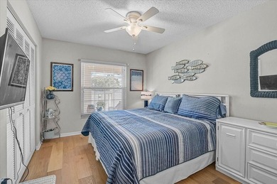 Welcome to this beautiful second-floor end-unit condominium on Peridia Golf and Country Club in Florida - for sale on GolfHomes.com, golf home, golf lot