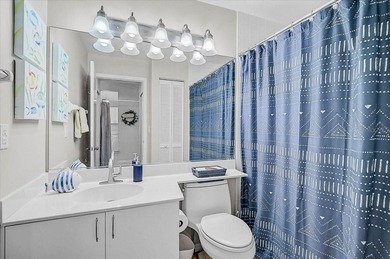 Welcome to this beautiful second-floor end-unit condominium on Peridia Golf and Country Club in Florida - for sale on GolfHomes.com, golf home, golf lot