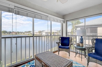 Welcome to this beautiful second-floor end-unit condominium on Peridia Golf and Country Club in Florida - for sale on GolfHomes.com, golf home, golf lot