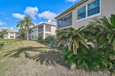 Welcome to this beautiful second-floor end-unit condominium on Peridia Golf and Country Club in Florida - for sale on GolfHomes.com, golf home, golf lot