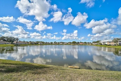 Welcome to this beautiful second-floor end-unit condominium on Peridia Golf and Country Club in Florida - for sale on GolfHomes.com, golf home, golf lot