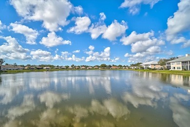 Welcome to this beautiful second-floor end-unit condominium on Peridia Golf and Country Club in Florida - for sale on GolfHomes.com, golf home, golf lot