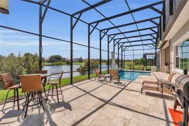 EXQUISITE WATERFRONT GOLF COURSE POOL HOME IN EAGLE CREEK -- on Eagle Creek Golf Club in Florida - for sale on GolfHomes.com, golf home, golf lot