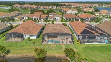 EXQUISITE WATERFRONT GOLF COURSE POOL HOME IN EAGLE CREEK -- on Eagle Creek Golf Club in Florida - for sale on GolfHomes.com, golf home, golf lot