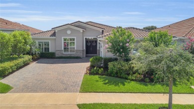 EXQUISITE WATERFRONT GOLF COURSE POOL HOME IN EAGLE CREEK -- on Eagle Creek Golf Club in Florida - for sale on GolfHomes.com, golf home, golf lot