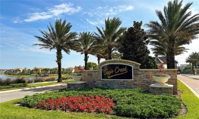 EXQUISITE WATERFRONT GOLF COURSE POOL HOME IN EAGLE CREEK -- on Eagle Creek Golf Club in Florida - for sale on GolfHomes.com, golf home, golf lot