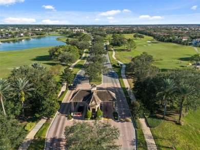 EXQUISITE WATERFRONT GOLF COURSE POOL HOME IN EAGLE CREEK -- on Eagle Creek Golf Club in Florida - for sale on GolfHomes.com, golf home, golf lot