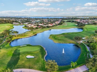 EXQUISITE WATERFRONT GOLF COURSE POOL HOME IN EAGLE CREEK -- on Eagle Creek Golf Club in Florida - for sale on GolfHomes.com, golf home, golf lot