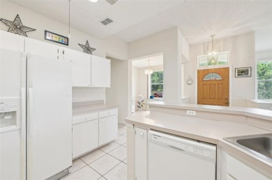 Welcome to this charming 2-bedroom, 2-bath waterfront condo in on Falcon Watch Golf Club in Florida - for sale on GolfHomes.com, golf home, golf lot