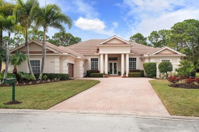 Discover luxury living in this beautifully updated pool home in on PGA Golf Club in PGA Village in Florida - for sale on GolfHomes.com, golf home, golf lot