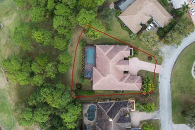 Discover luxury living in this beautifully updated pool home in on PGA Golf Club in PGA Village in Florida - for sale on GolfHomes.com, golf home, golf lot