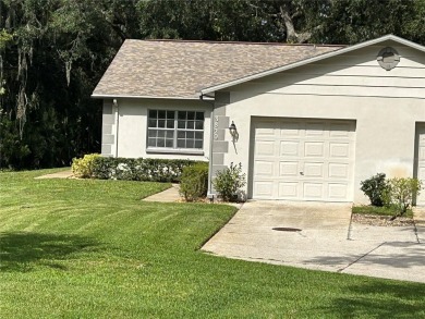 FANTASTIC INVESTMENT OPPORTUNITY TO PICK UP THIS FIXER UPPER IN on Seven Springs Golf and Country Club in Florida - for sale on GolfHomes.com, golf home, golf lot